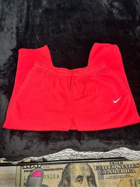Nike Men X-Large Red Fleece Sweatpants Solo Swoosh Logo Athletic Casual Open Hem
